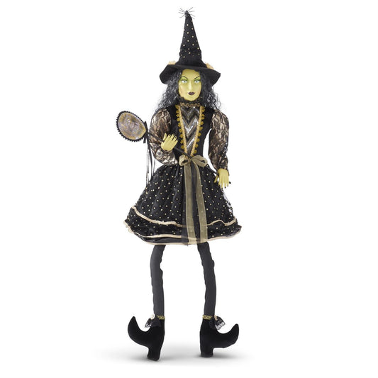 Sitting Witch with Black and Gold Dot Dress