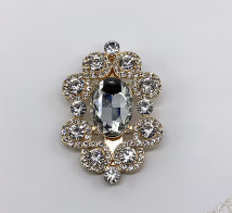 Oval Crystal and Gold Ribbon Clip